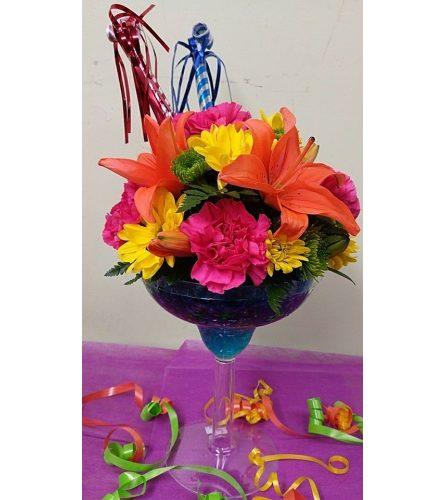 CELEBRATE. An arrangement by Avenue Flowers and Gifts.