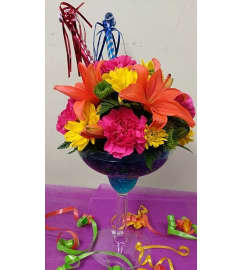 CELEBRATE. An arrangement by Avenue Flowers and Gifts.