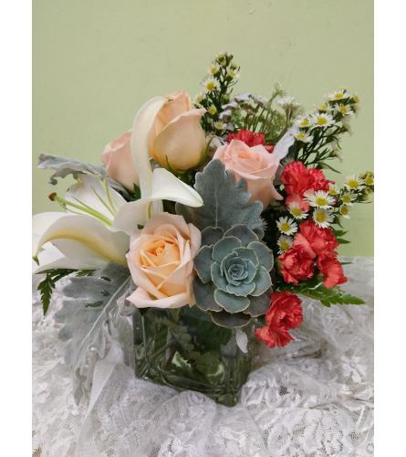 pearly peach. An arrangement by Avenue Flowers and Gifts.