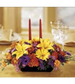Autumn Breeze Centerpiece. An arrangement by Avenue Flowers and Gifts.