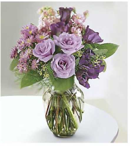 Lavender Kiss. An arrangement by Avenue Flowers and Gifts.