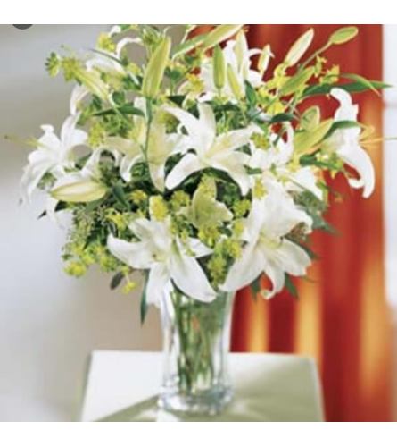 White Lily Elegance. An arrangement by Avenue Flowers and Gifts.