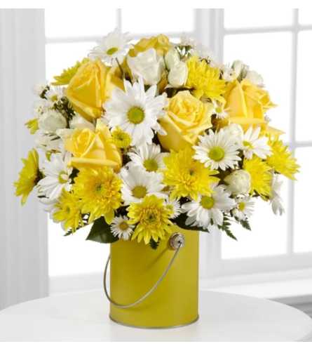 Sunshines. An arrangement by Avenue Flowers and Gifts.
