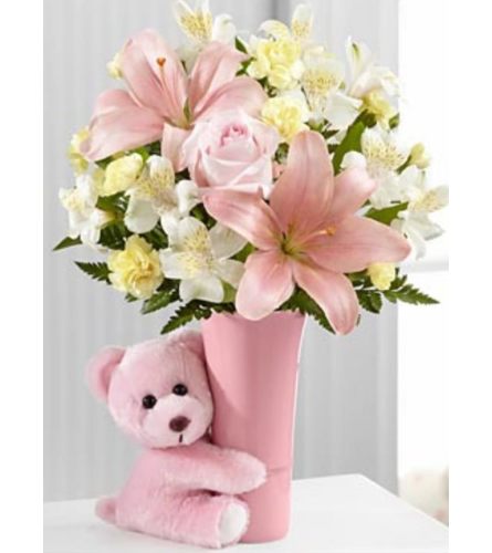 Baby Girl Hug. An arrangement by Avenue Flowers and Gifts.