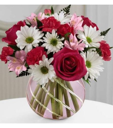 Pink Berry. An arrangement by Avenue Flowers and Gifts.