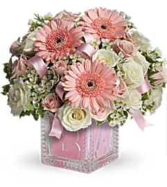 Baby Girl First Block. An arrangement by Avenue Flowers and Gifts. Baby Girl First Block. An arrangement by Avenue Flowers and Gifts.