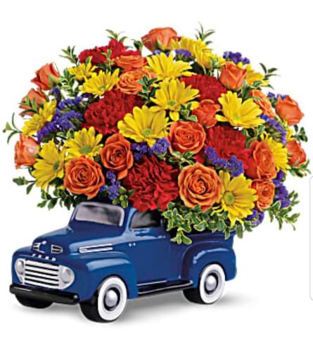 Ford Pickup 1948 Replica. An arrangement by Avenue Flowers and Gifts.