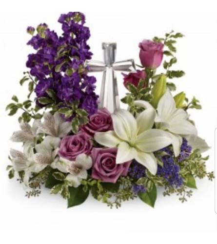 Crystal Cross Melancholy Moments. An arrangement by Avenue Flowers and Gifts.