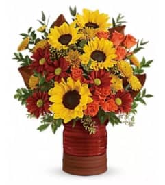 Rustic Heirloom Sunflower. An arrangement by Avenue Flowers and Gifts. Rustic Heirloom Sunflower. An arrangement by Avenue Flowers and Gifts.