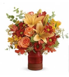 Tawny Red Autumn. An arrangement by Avenue Flowers and Gifts. Tawny Red Autumn. An arrangement by Avenue Flowers and Gifts.