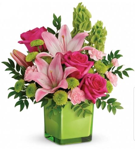 Pink Apple. An arrangement by Avenue Flowers and Gifts.