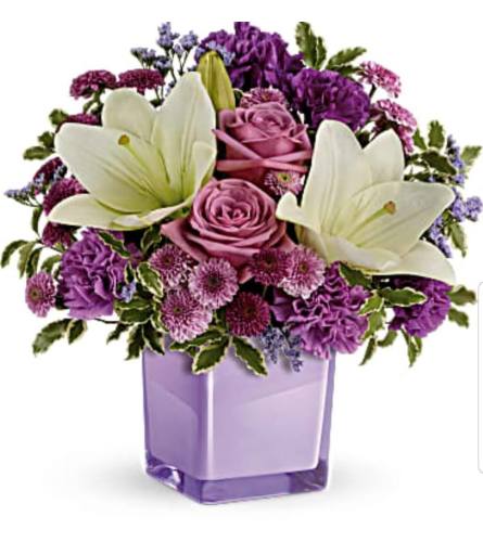 Pleasant Purple. An arrangement by Avenue Flowers and Gifts.