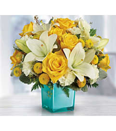 Turquoise Laughter. An arrangement by Avenue Flowers and Gifts. Turquoise Laughter. An arrangement by Avenue Flowers and Gifts.
