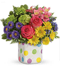 Festive Dots. An arrangement by Avenue Flowers and Gifts. Festive Dots. An arrangement by Avenue Flowers and Gifts.