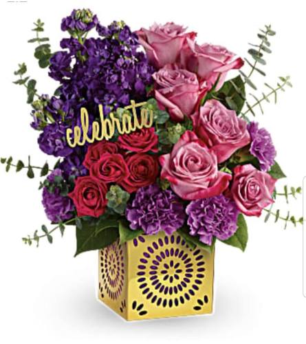 Go Celebrate. An arrangement by Avenue Flowers and Gifts.