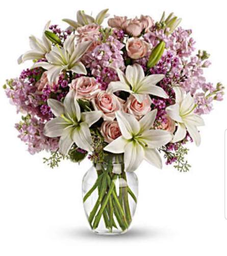 Blossoms of Romance. An arrangement by Avenue Flowers and Gifts.