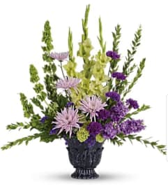 Cherished Lavender Tribute. An arrangement by Avenue Flowers and Gifts.