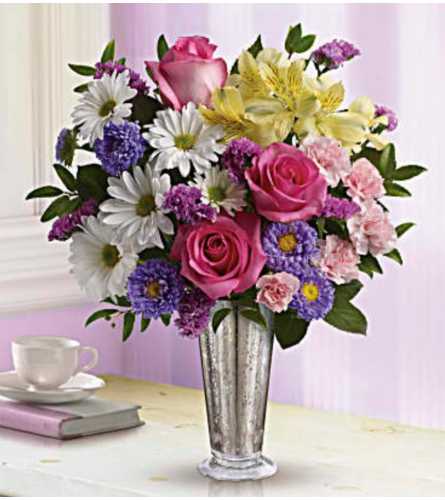 Shine. An arrangement by Avenue Flowers and Gifts.