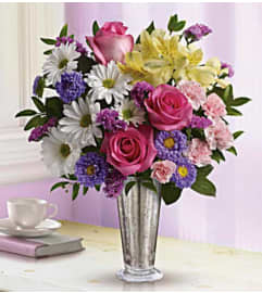 Shine. An arrangement by Avenue Flowers and Gifts.