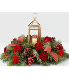 Home for Christmass. An arrangement by Avenue Flowers and Gifts.