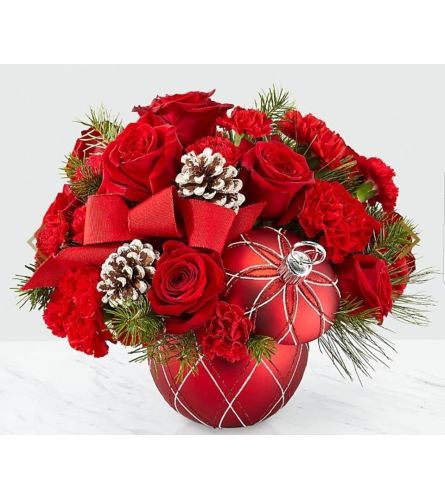 Beautiful Red Christmas Ornament. An arrangement by Avenue Flowers and Gifts.