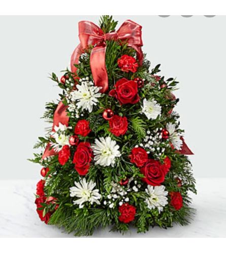 Beautiful Boxwood tree Arrangement. An arrangement by Avenue Flowers and Gifts.