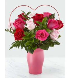 X O X O X O. An arrangement by Avenue Flowers and Gifts.