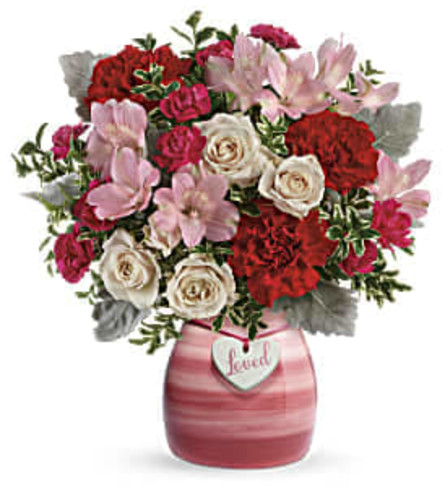 Painted In Love. An arrangement by Avenue Flowers and Gifts.