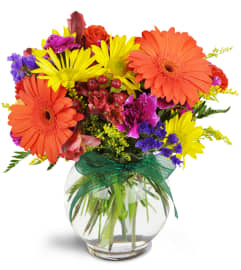 Sunglow Blooms™. An arrangement by Avenue Flowers and Gifts.