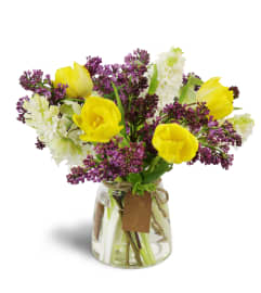 With Tulips on Top™. An arrangement by Avenue Flowers and Gifts.