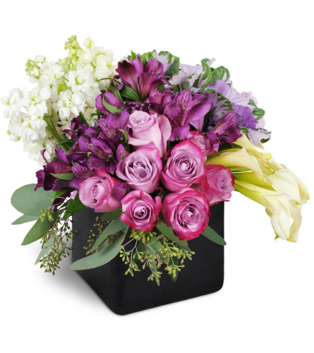 Breathtaking Beauty™ - Deluxe. An arrangement by Avenue Flowers and Gifts. This stunning bouquet includes lavender roses, purple Peruvian lilies,...