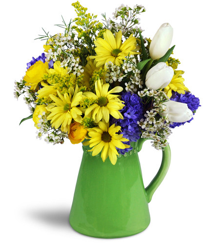 Garden Gathering™. An arrangement by Avenue Flowers and Gifts. Yellow daisies, hyacinth, tulips, and more in a keepsake ceramic vase..