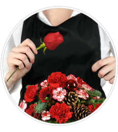 Very Merry Christmas Artist’s Design. An arrangement by Avenue Flowers and Gifts.