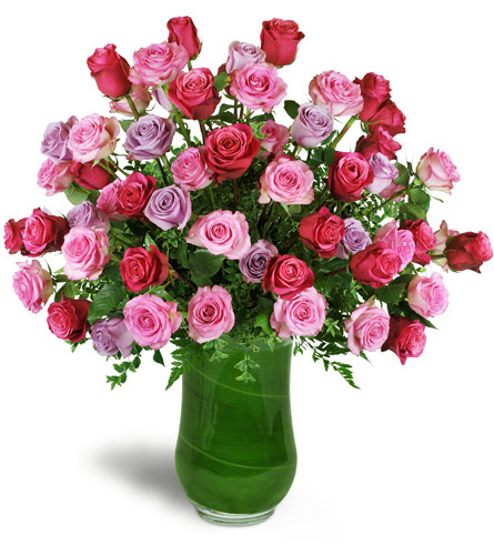 Infinite Love Roses™. An arrangement by Avenue Flowers and Gifts. Five dozen premium roses in fuchsia, pink, and lavender are expertly arranged in...