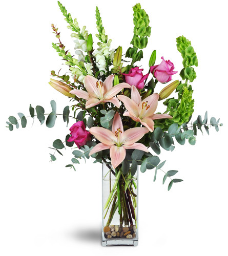 Sweet Pink Romance™. An arrangement by Avenue Flowers and Gifts. Fuchsia roses, pink Asiatic lilies, snapdragons, and bells of Ireland are sweetly...