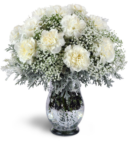 Festival of Flurries™. An arrangement by Avenue Flowers and Gifts. Treat them to white carnations arranged with airy baby’s breath and dusty miller..