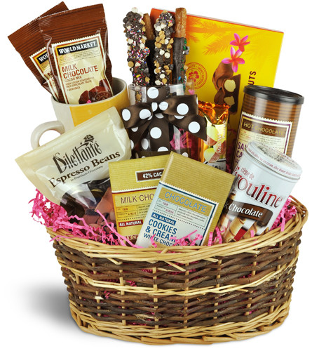Chocolate Lovers Basket™. An arrangement by Avenue Flowers and Gifts. Treat them to chocolate-covered pretzels, chocolate bars, chocolate-covered...