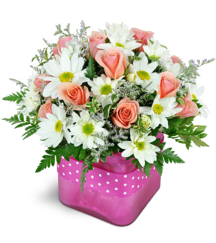 Bubble Gum Bliss™ - Deluxe. An arrangement by Avenue Flowers and Gifts. A fun mix of pink spray roses, white daisies, and fresh greenery are...