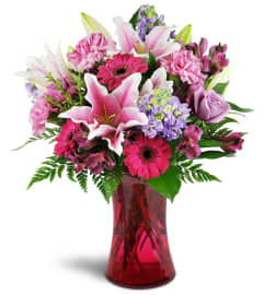 Bright Medley™. An arrangement by Avenue Flowers and Gifts.