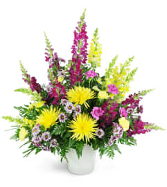 Warm Remembrance. An arrangement by Avenue Flowers and Gifts.