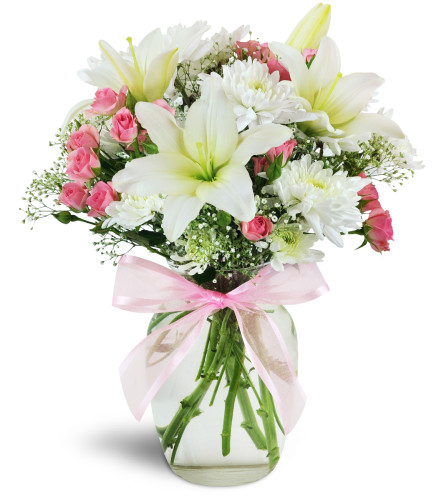 Little Sweetheart - Deluxe. An arrangement by Avenue Flowers and Gifts. Pink spray roses, white chrysanthemums, and baby's breath are expertly...