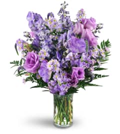 Purple Passion. An arrangement by Avenue Flowers and Gifts. Purple Passion. An arrangement by Avenue Flowers and Gifts.