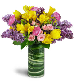 Spring Smiles™. An arrangement by Avenue Flowers and Gifts.