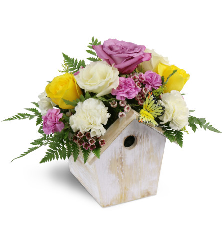 Birdhouse of Blooms - Deluxe. An arrangement by Avenue Flowers and Gifts. Delight them with an arrangement of roses, carnations, and more in a...