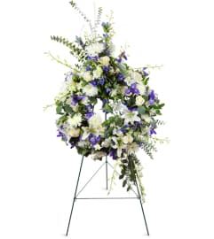 Enduring Love Wreath™. An arrangement by Avenue Flowers and Gifts.