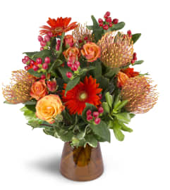 Energetic Orange™. An arrangement by Avenue Flowers and Gifts.