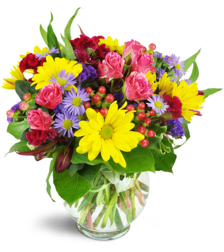 Joyful Thanks™ - Deluxe. An arrangement by Avenue Flowers and Gifts. Yellow daisies, purple asters, pink spray roses, and more are delightfully...