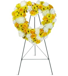 Love is Golden Heart™. An arrangement by Avenue Flowers and Gifts.