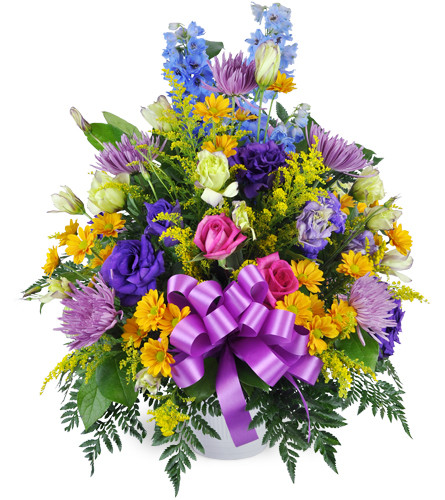 Our Special Garden. An arrangement by Avenue Flowers and Gifts. Fuji mums, roses, daisies, and more are gracefully arranged in a tribute container..