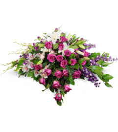 Forever Adored Casket Spray. An arrangement by Avenue Flowers and Gifts.
